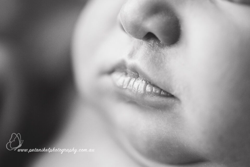 macro newborn baby’s lips