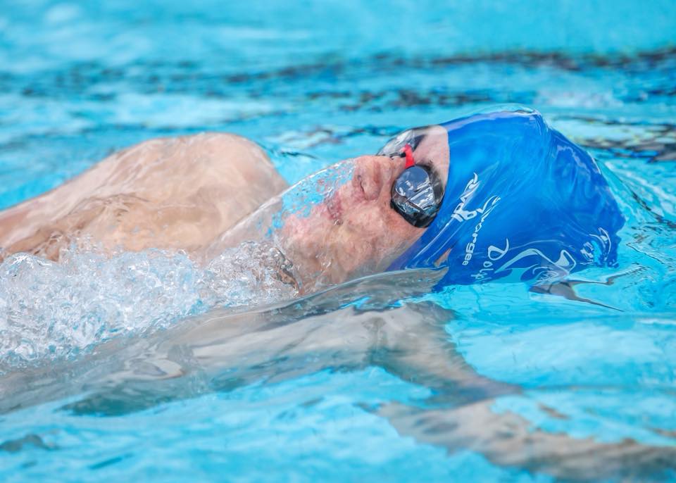 person swimming in pool close-up