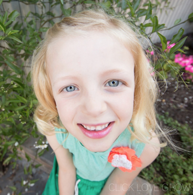 smiling girl portrait lens distortions 