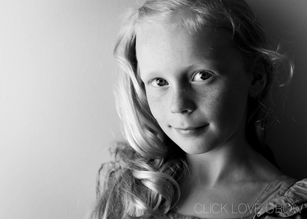 black and white portrait of blonde haired girl