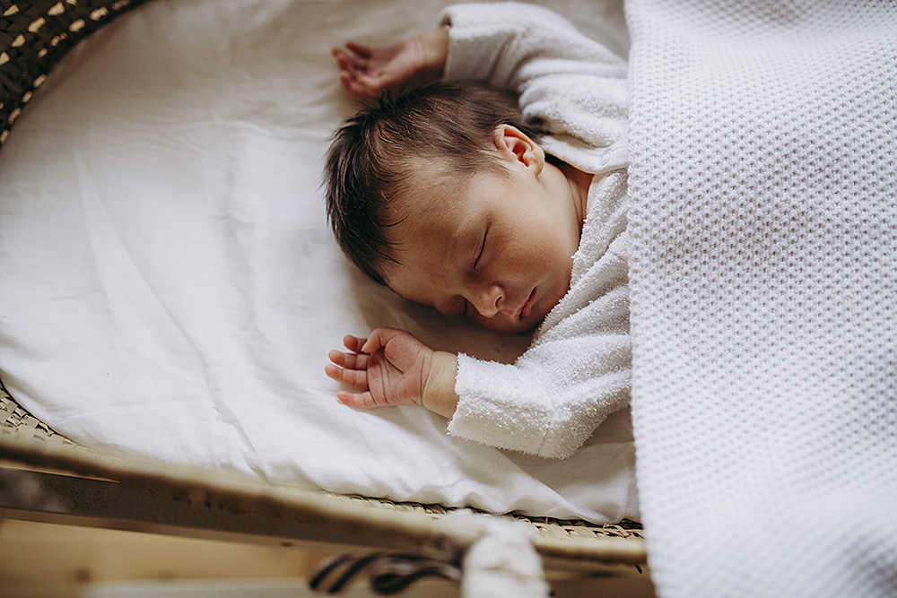 lifestyle pictures of newborn sleeping
