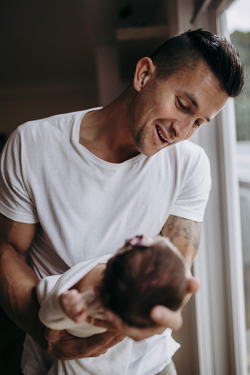 photography tips for low light capture of father with baby