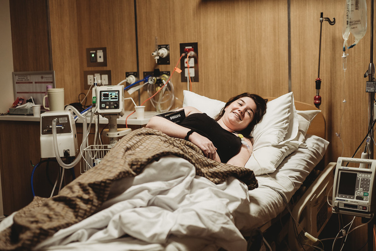 pregnant woman on hospital bed