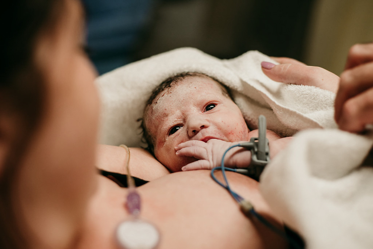 newborn baby in birth photography