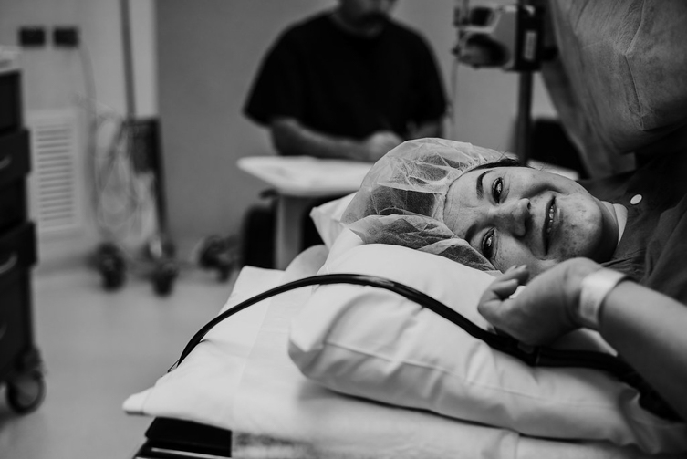 cute moments of woman smiling after c-section