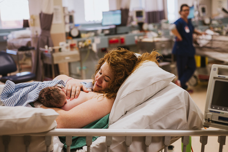 woman with baby in the recovery room