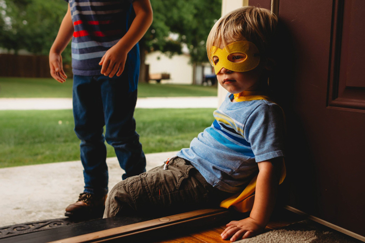 brothers photo shoot relaxing by the doorstep