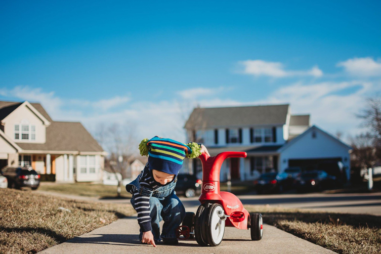 little boy playing outside