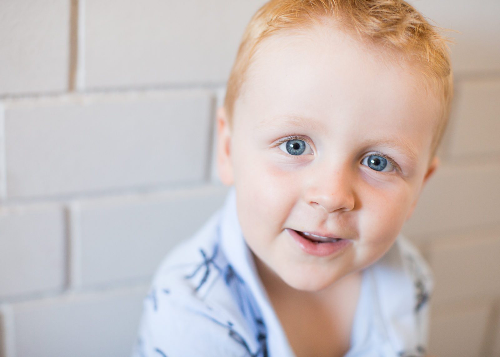 portrait of little boy with blue eyes
