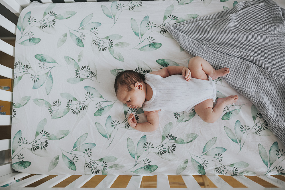 diy newborn photography ideas for shots of baby inside crib