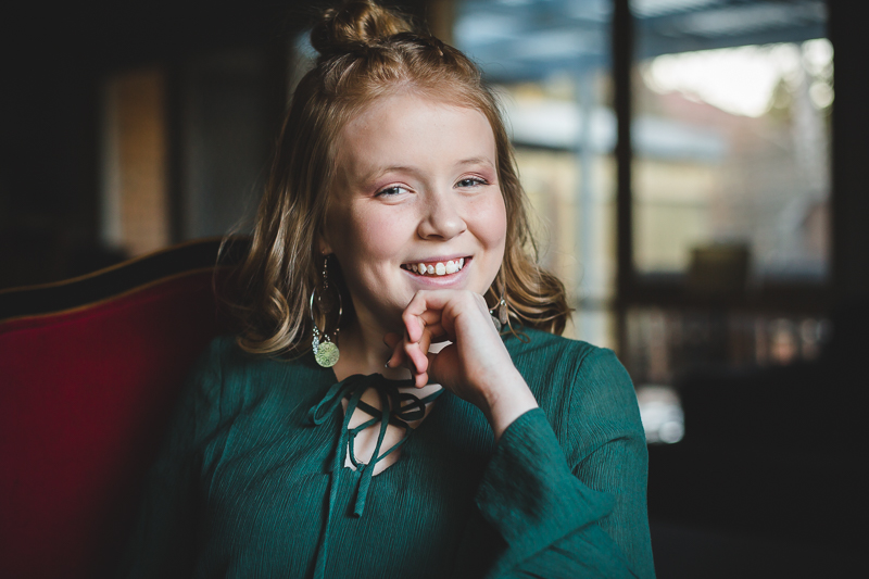  portrait of smiling girl with blurred background