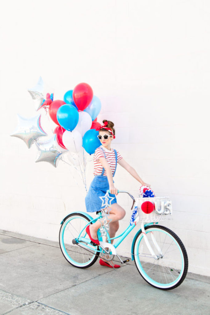 4th of July pictures of girl riding a bike