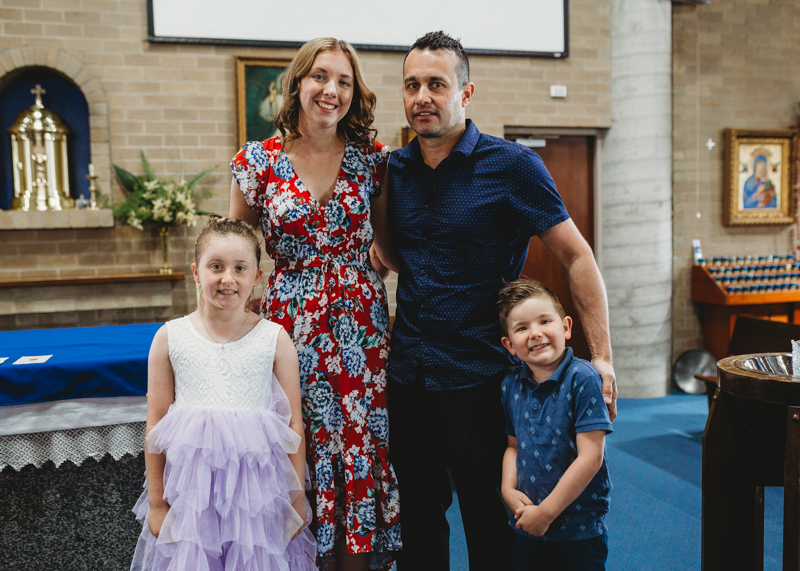 parents with children in church