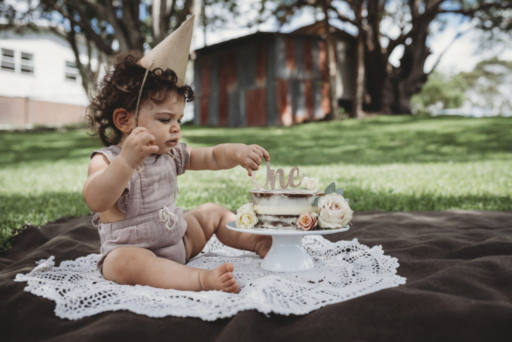 baby girl outdoor smash cake photos