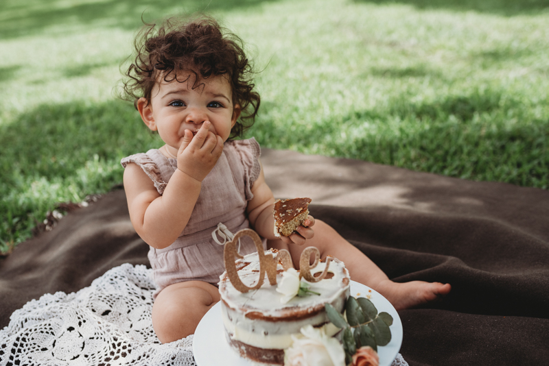 first birthday baby smashing cake 