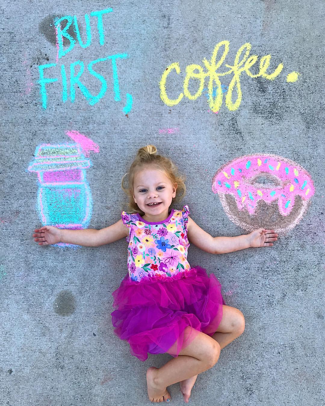 little girl with cake sidewalk chalk designs