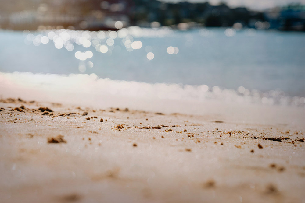 beach with sparkling water bokeh