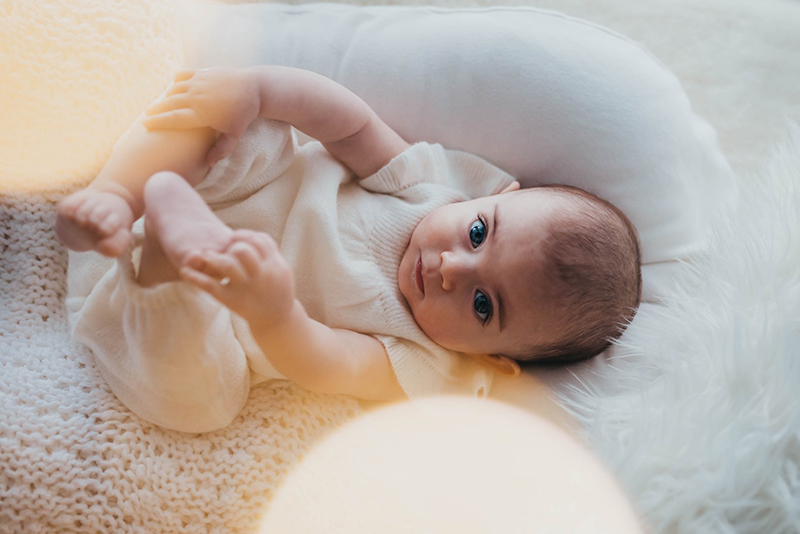 photoshoot ideas of baby and fairy lights