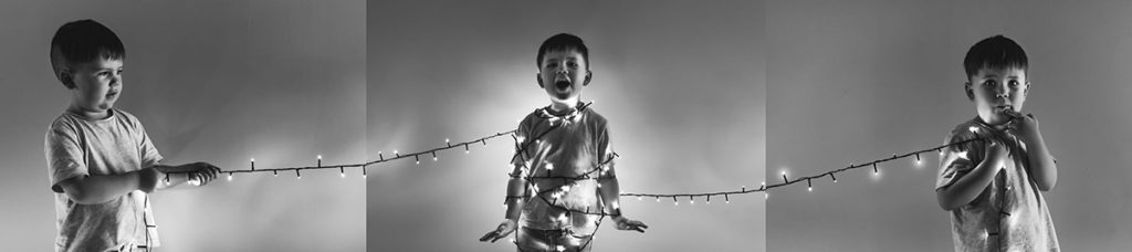 photoshoot ideas for picture collage of boy wrapped in twinkle lights