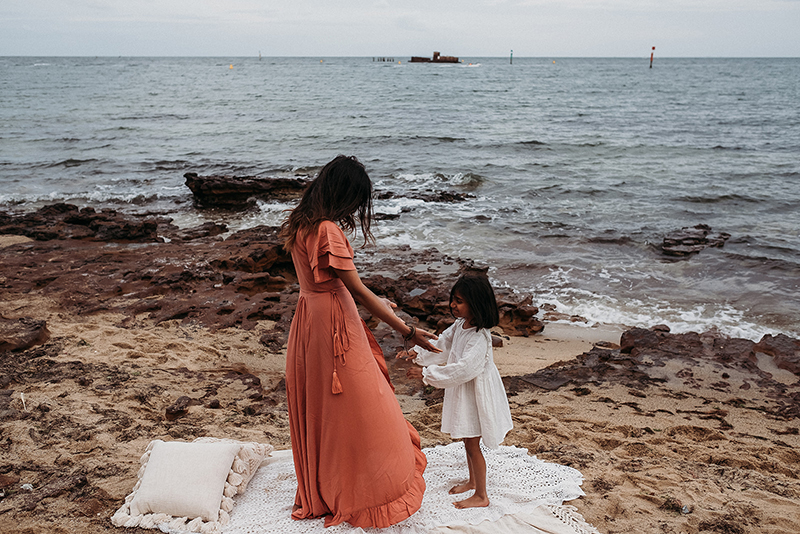 motherhood session images by the sea