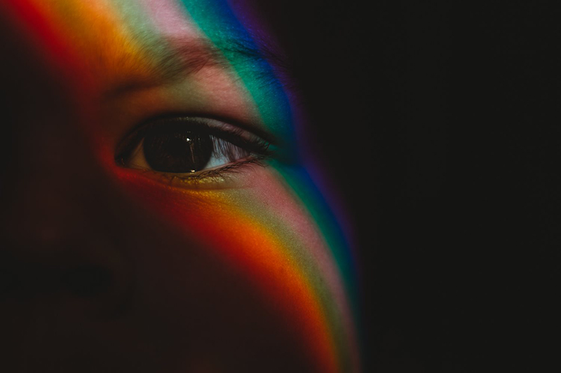 half face with rainbow