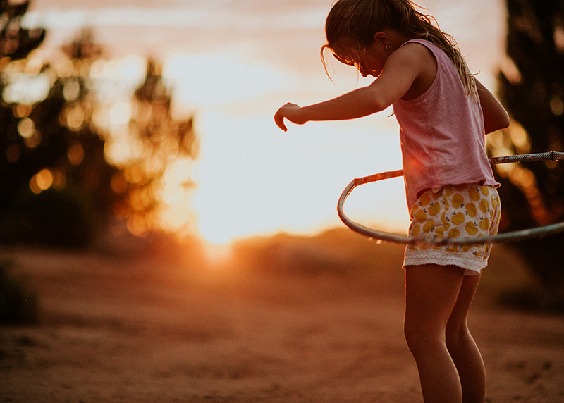 picture of girl with hula hoop shot with manual focus