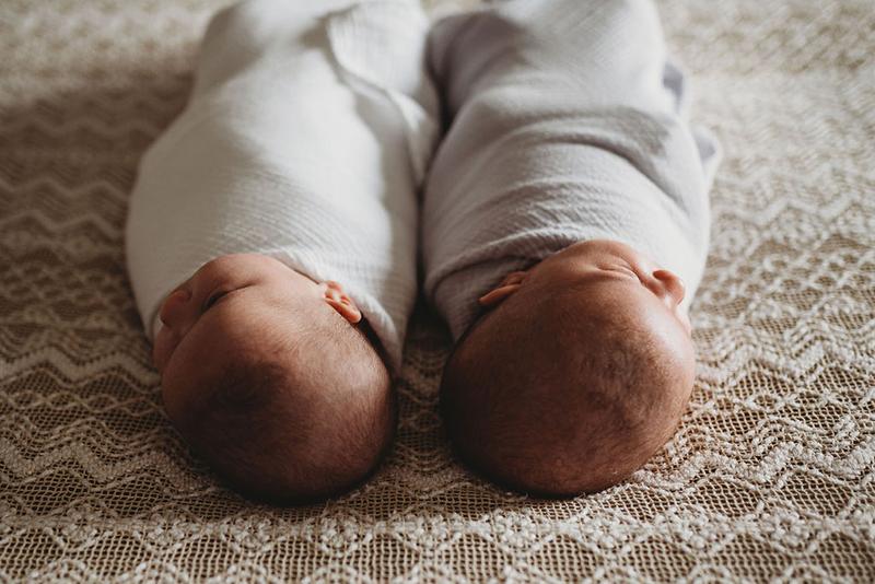  newborn twins shot from above their heads