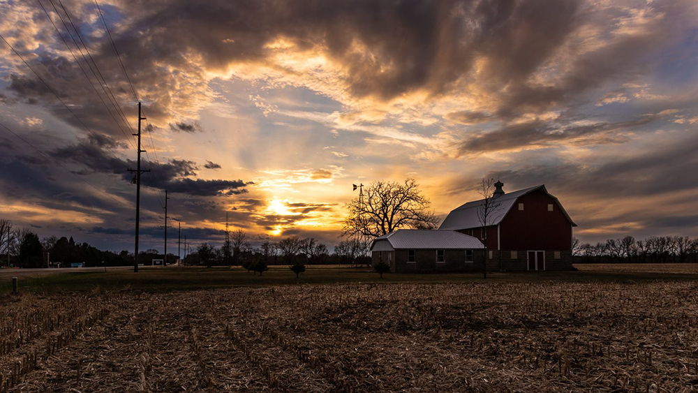 landscape photography of farm at sunrise