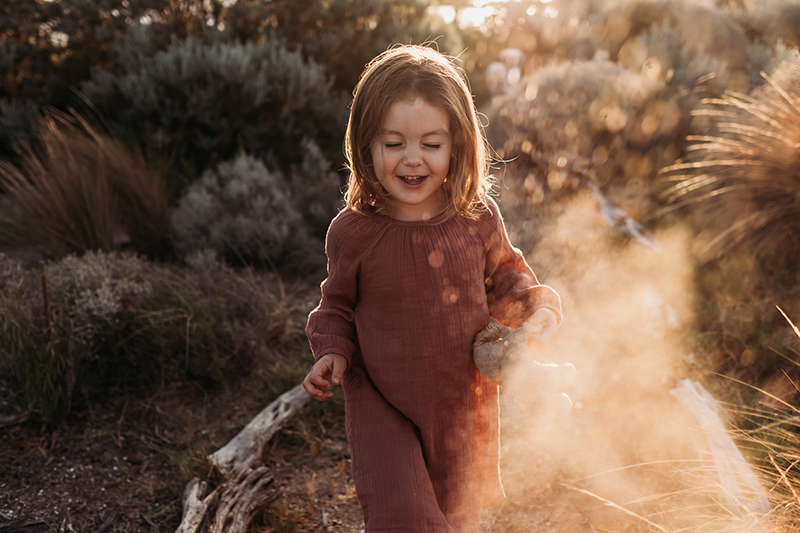 backlit image of girl in nature