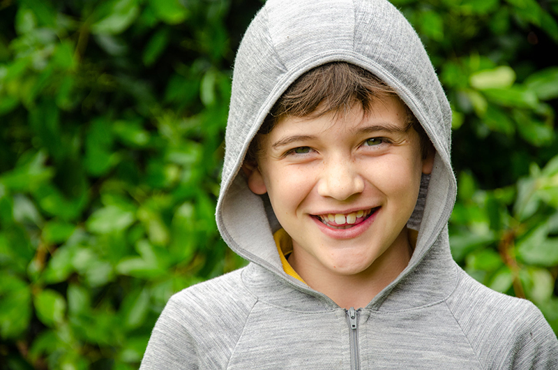 photography classes for beginners portrait of boy wearing hoodie