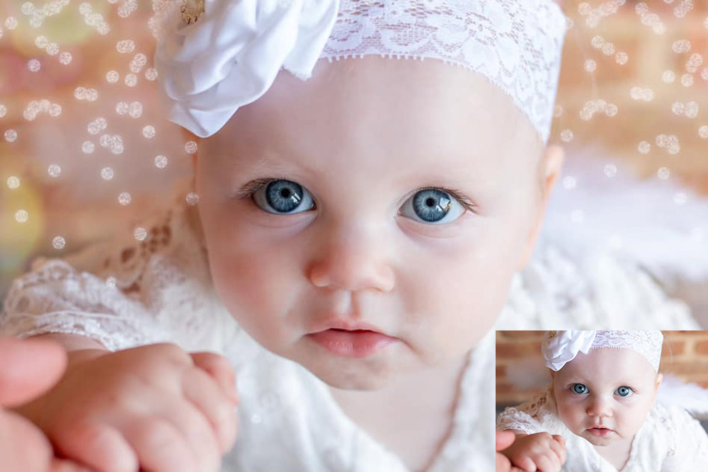 baby girl with big blue eyes and white headband