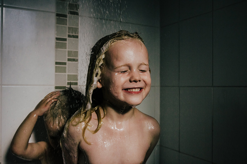 documentary photo of girl with wet hair