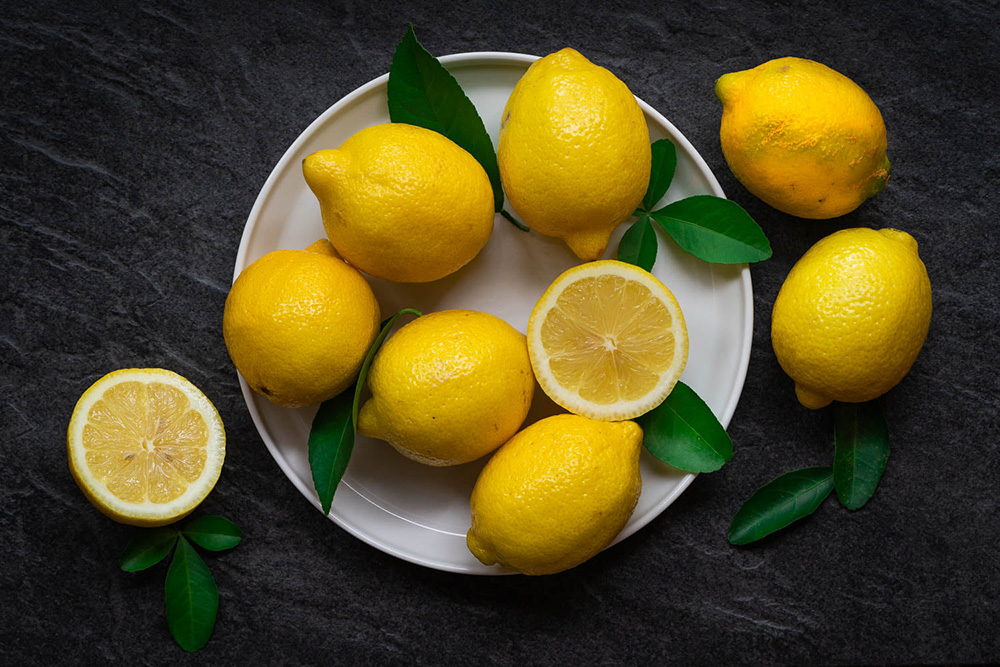 flatlay of lemons in a bowl