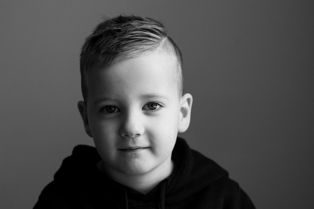 black and white portrait of young boy