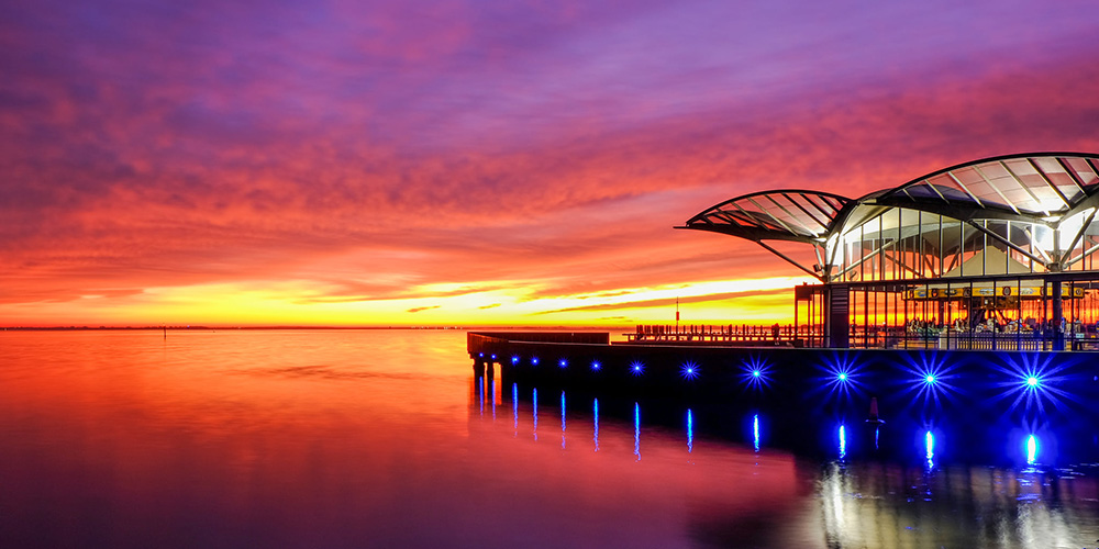 spectacularly coloured sunset sky over water