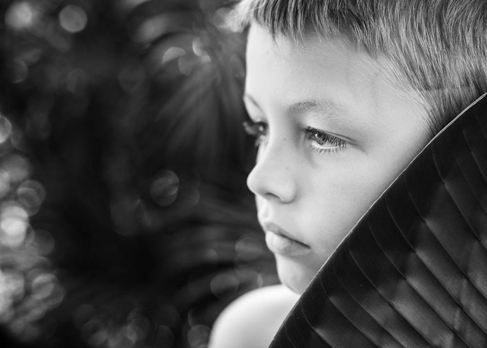 black and white portrait of young boy