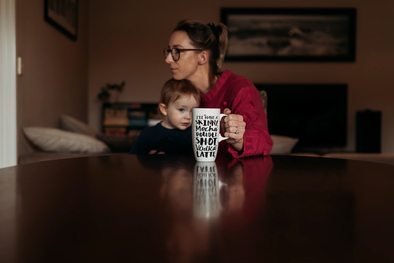 self portrait of mum and son at the table with coffee cup
