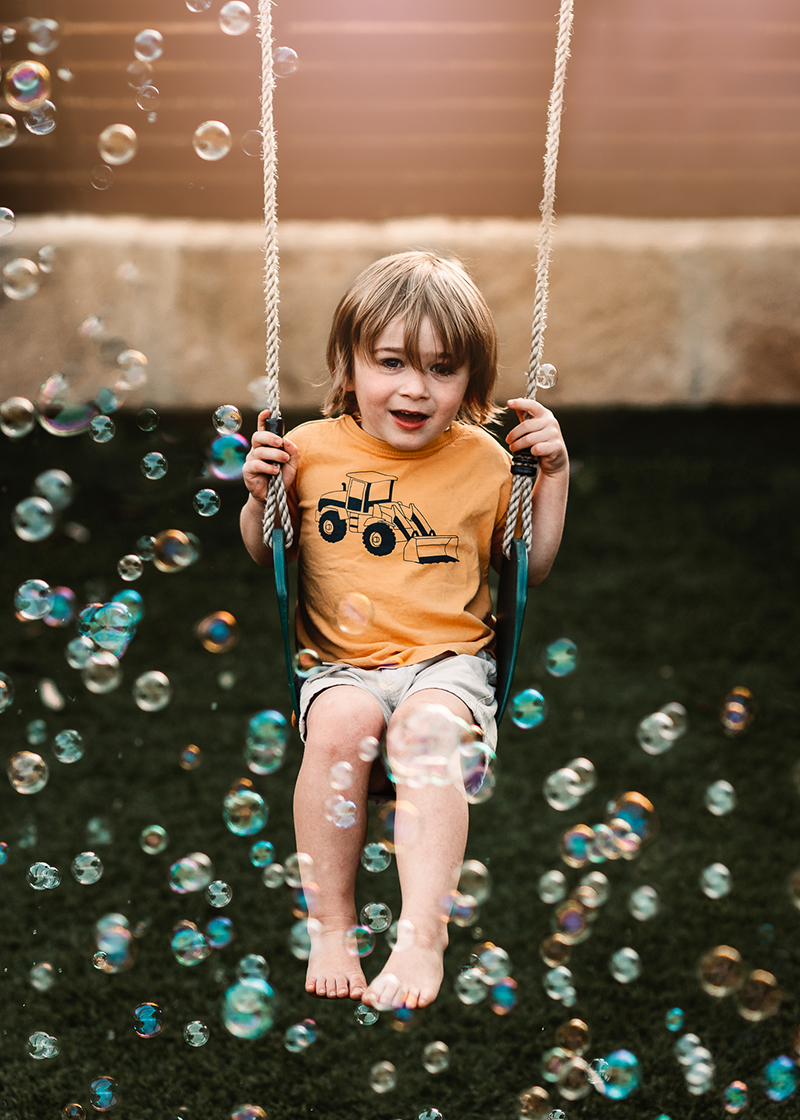 kids photography boy on swing bubbles