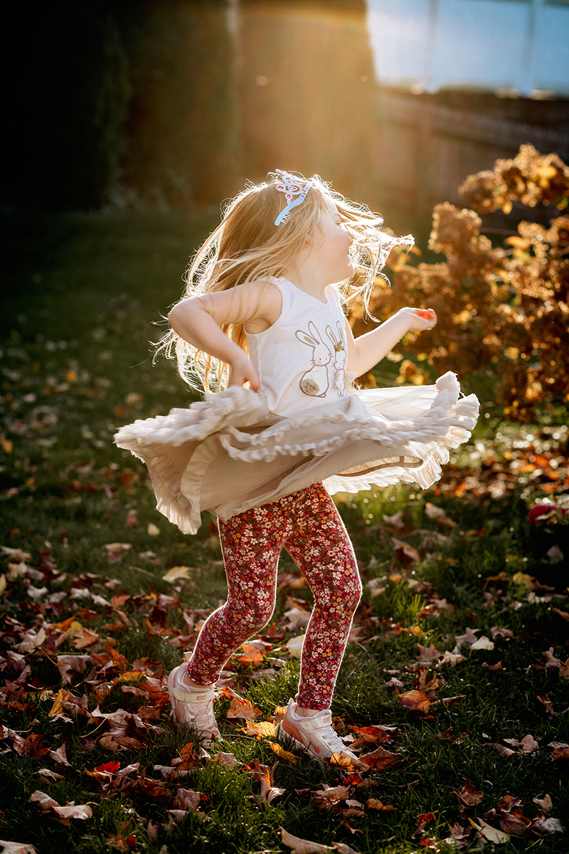 kids portraits girl dancing golden hour