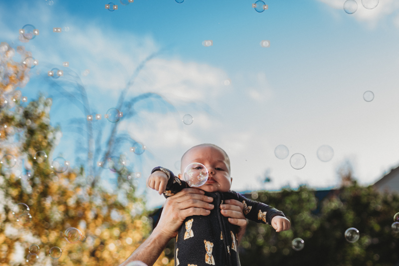 portrait of baby with bubbles