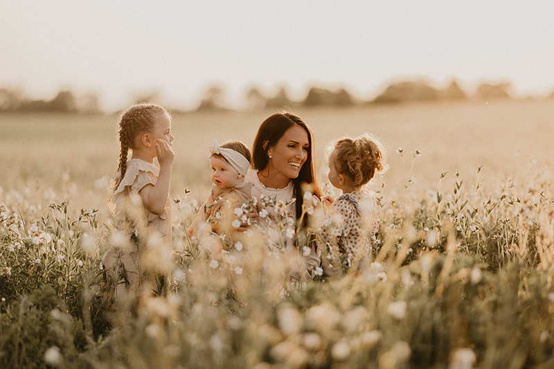 Mother and 3 daughters in field