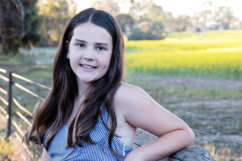 portrait girl field blue dress critiquing